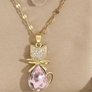 Gold Necklace with Pink Gemstone Cat Pendant. (Box not included)